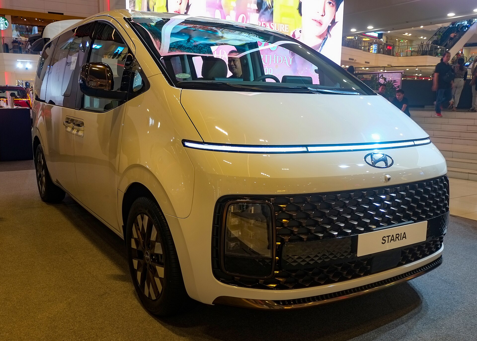 Hyundai Staria, shown in a full-body exterior view as an example of the 9-seat MPV / group van rental class