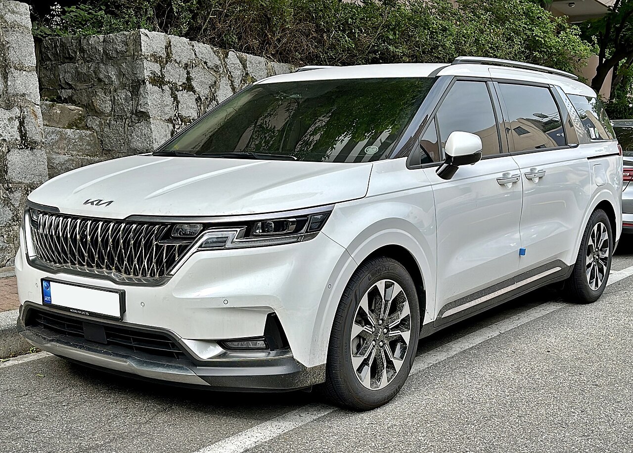 Kia Carnival KA4, shown in a full-body exterior view as an example of the Large SUV / minivan rental class