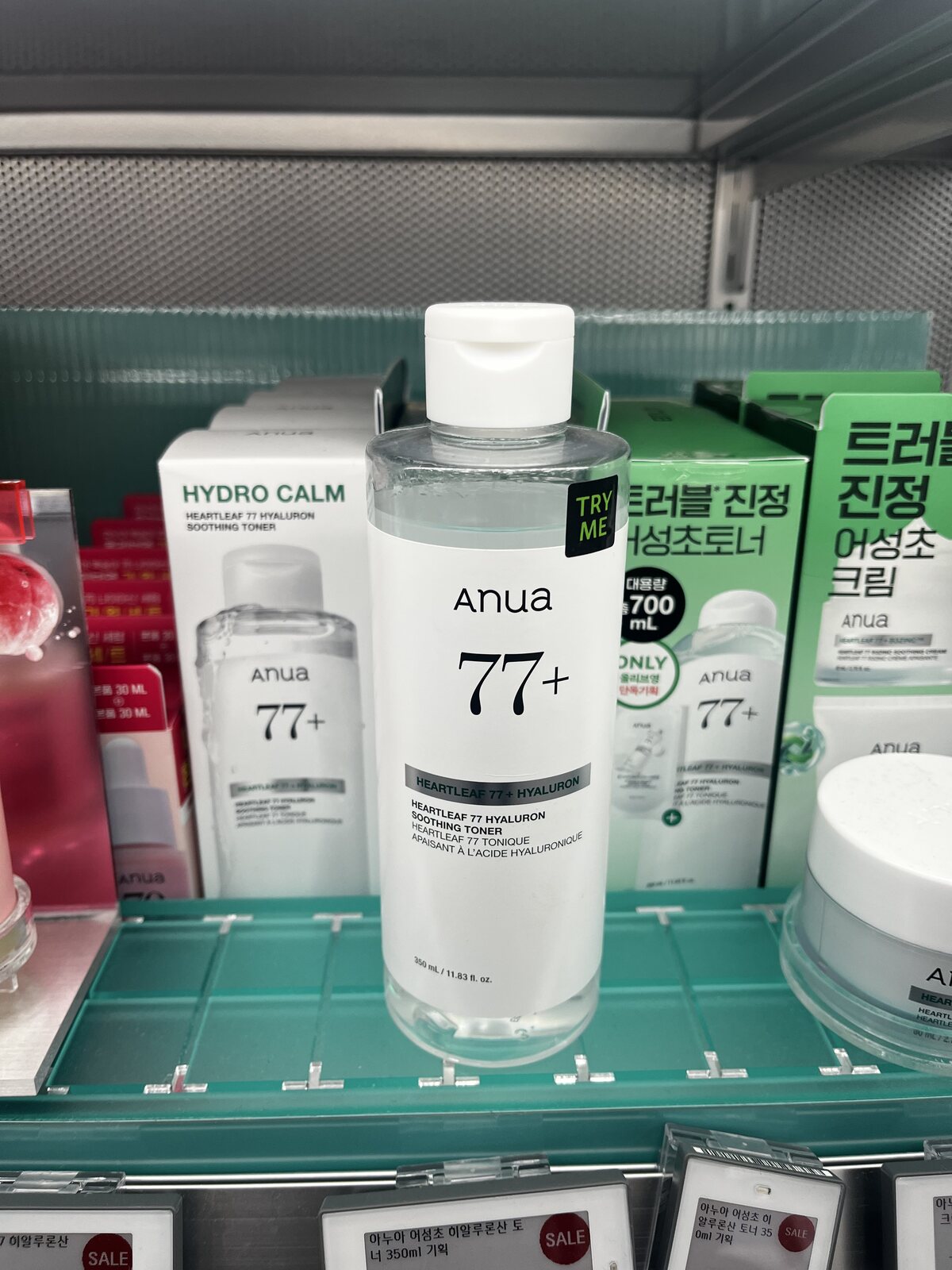 Original VEMORIQ photograph of Korean skincare products on a store shelf